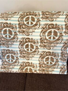 Cozy Peace Symbol Fleece Fabric - Aqua Blue & Brown